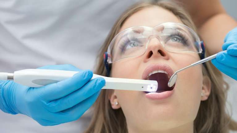 woman during routine checkup and cleaning