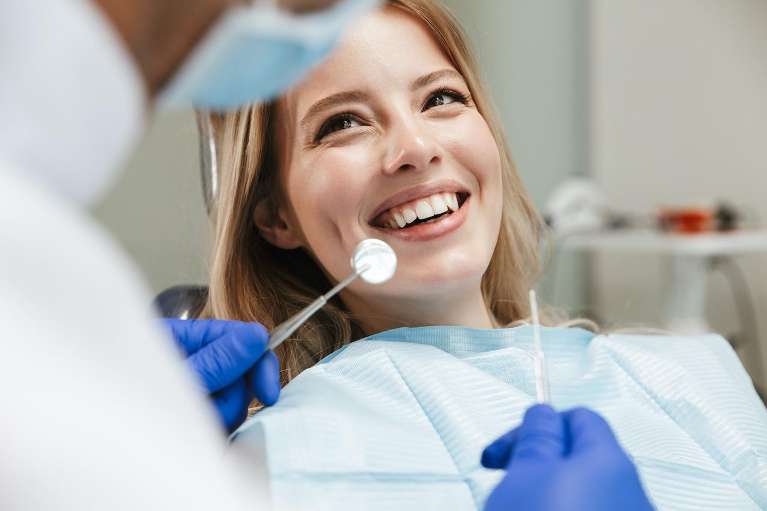 Smiling teen after wisdom teeth extraction in El Dorado Hills