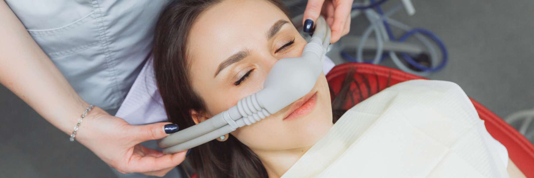 Patient receiving nitrous oxide sedation for tooth extraction in El Dorado Hills.