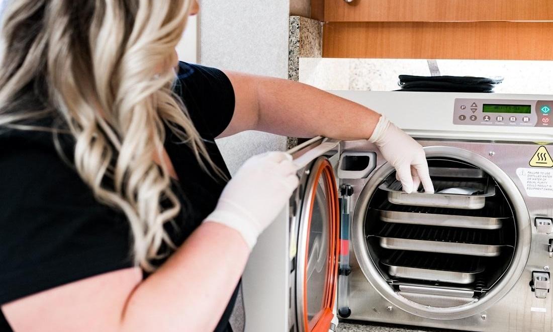 dental assistant using sterilization machine at el dorado family dental